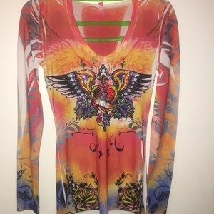 Long sleeve silky shirt.